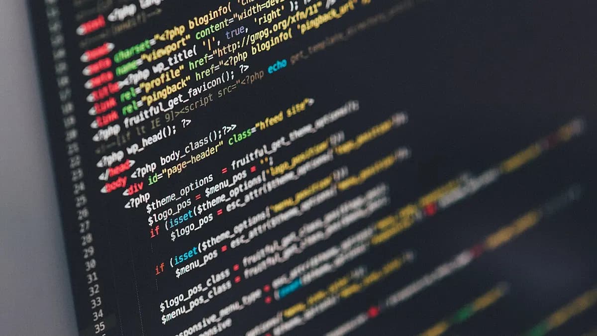 Colourful lines of code on a dark screen